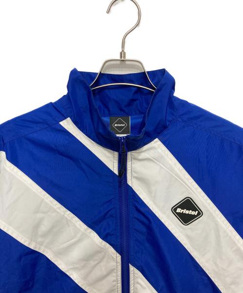 F.C.R.B.（エフシーレアルブリストル）F.C.R.B. (エフシーレアルブリストル) F.C.R.B. STAND COLLAR STRIPE JACKET　ナイロンジップアップジャケット ブルー サイズ:Lの古着・服飾アイテム