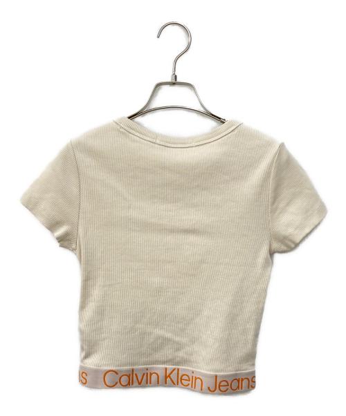 Calvin Klein Jeans（カルバンクラインジーンズ）Calvin Klein Jeans (カルバンクラインジーンズ) 裾ロゴカットソー ベージュ サイズ:Sの古着・服飾アイテム