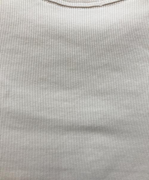 Calvin Klein Jeans（カルバンクラインジーンズ）Calvin Klein Jeans (カルバンクラインジーンズ) 裾ロゴカットソー ベージュ サイズ:Sの古着・服飾アイテム