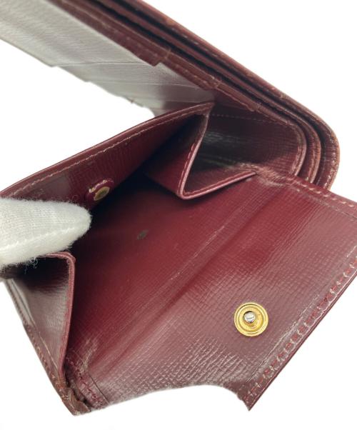 Cartier（カルティエ）Cartier (カルティエ) 2つ折り財布 ボルドーの古着・服飾アイテム