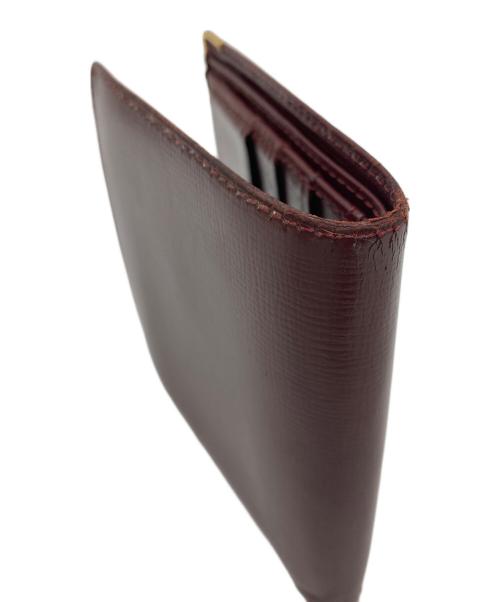 Cartier（カルティエ）Cartier (カルティエ) 2つ折り財布 ボルドーの古着・服飾アイテム