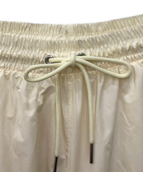 NIKE（ナイキ）NIKE (ナイキ) スウッシュウーブンパンツ ベージュ サイズ:Mの古着・服飾アイテム