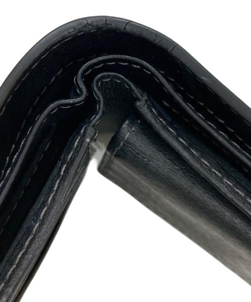 Calvin Klein（カルバンクライン）Calvin Klein (カルバンクライン) 2つ折り財布 ブラックの古着・服飾アイテム