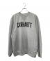 CarHartt（カーハート）の古着「ロゴプリントスウェット」｜グレー