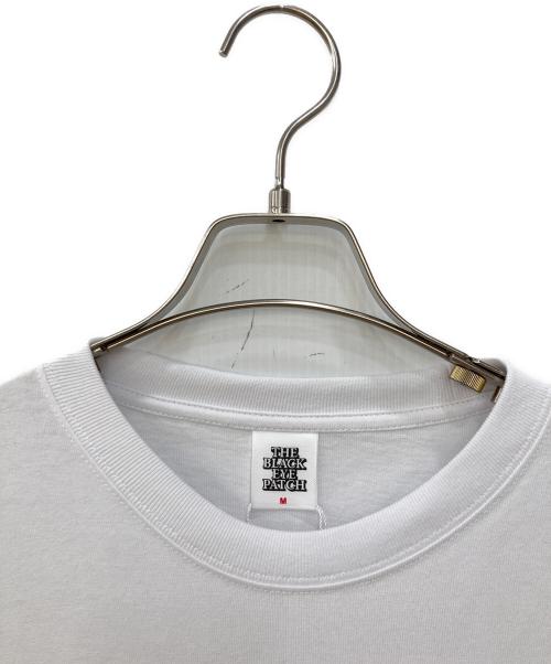 THE BLACK EYE PATCH（ブラックアイパッチ）THE BLACK EYE PATCH (ブラックアイパッチ) x Team Tomodachi HWC Tee ホワイト サイズ:Mの古着・服飾アイテム