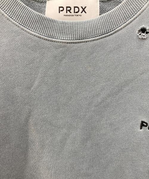 PARADOX（パラドックス）PARADOX (パラドックス) BADBOYPRDX ダメージスウェット ブルー サイズ:Lの古着・服飾アイテム