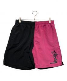 stussy（ステューシー）の古着「バイカラーハーフパンツ」｜ブラック×ピンク