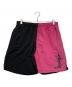 stussy（ステューシー）の古着「バイカラーハーフパンツ」｜ブラック×ピンク