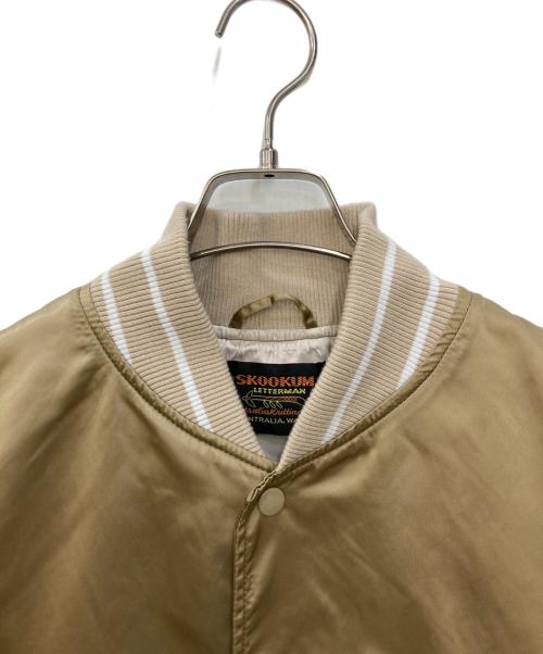 skookum（スクーカム）SKOOKUM (スクーカム) 別注スタジャン ベージュ サイズ:Ⅼの古着・服飾アイテム