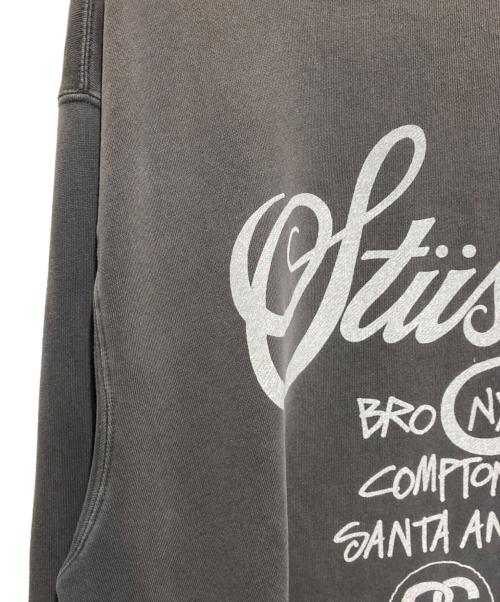 stussy（ステューシー）stussy (ステューシー) STUSSY WORLD TOUR CREW グレー サイズ:Lの古着・服飾アイテム