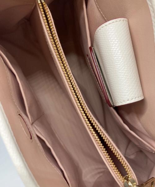 COACH（コーチ）COACH (コーチ) フラワーパンチング 2WAYバッグ ホワイトの古着・服飾アイテム