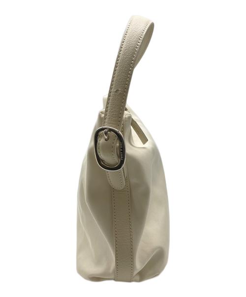 TOUT Y EST（トゥティエ）TOUT Y EST (トゥティエ) カノ トワル スモールバッグ アイボリーの古着・服飾アイテム