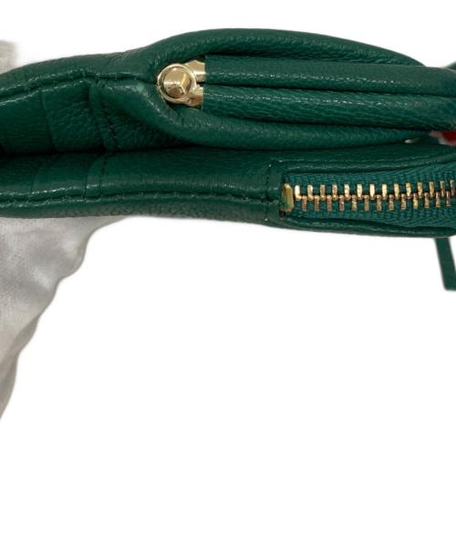 Perche（ペルケ）Perche (ペルケ) フリンジがま口財布の古着・服飾アイテム