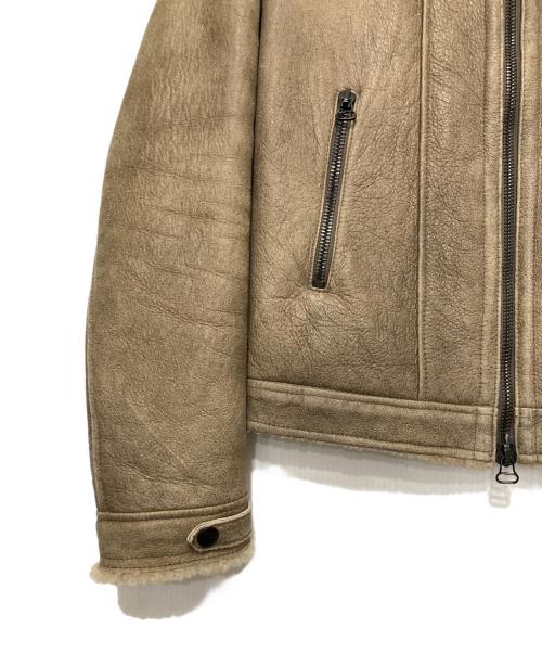 DACUTE（ダクテ）DACUTE (ダクテ) シープレザームートンシングルライダースジャケット ベージュ サイズ:46の古着・服飾アイテム