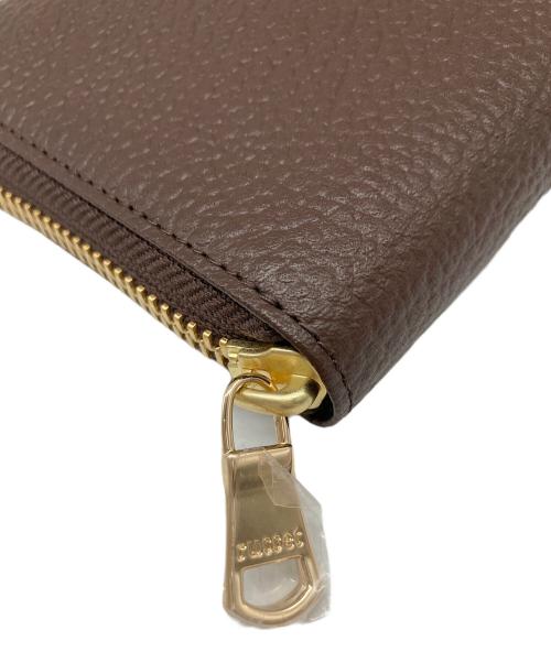 russet（ラシット）russet (ラシット) モノグラムプレートラウンドジップウォレット ブラウン サイズ:不明 未使用品の古着・服飾アイテム