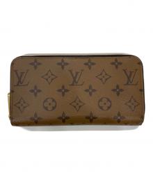 LOUIS VUITTON（ルイ ヴィトン）の古着「モノグラム・リバース ジッピー ウォレット」｜ブラウン