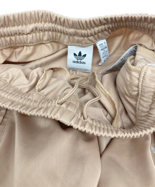 adidas（アディダス）adidas (アディダス) アディカラー クラシックス ファイヤーバード トラックパンツ ベージュ サイズ:XSの古着・服飾アイテム