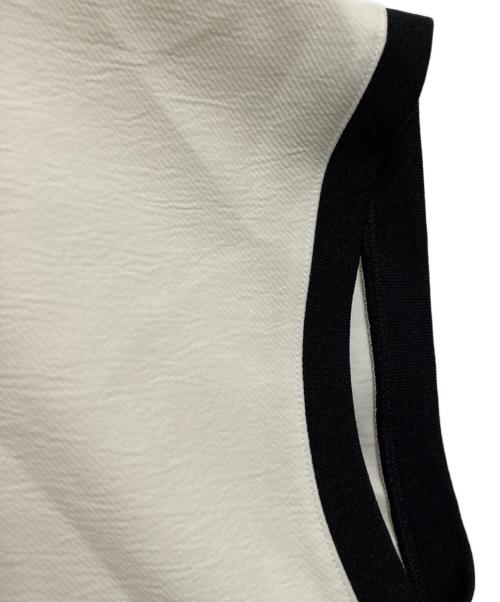 UNITED ARROWS（ユナイテッドアローズ）UNITED ARROWS (ユナイテッドアローズ) COMFY ドルマン ショートスリーブ ブラウス ―吸水速乾 UVカット ウォッシャブル― ホワイト×ブラック サイズ:不明の古着・服飾アイテム