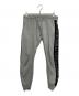 1PIU1UGUALE3 RELAX（ウノピゥウノウグァーレトレ リラックス）の古着「ヘビー裏毛ラインストーンロゴスウェットパンツ」｜グレー