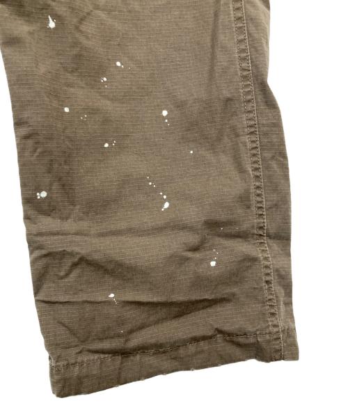 stussy（ステューシー）stussy (ステューシー) ペイントカーゴポケットパンツ ブラウン サイズ:32の古着・服飾アイテム