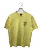 stussyステューシー）の古着「TRIBE STACK TEE トライブ スタック ティー」｜イエロー