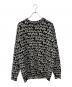 BALENCIAGA（バレンシアガ）の古着「総柄ロゴニット」｜ホワイト×ブラック