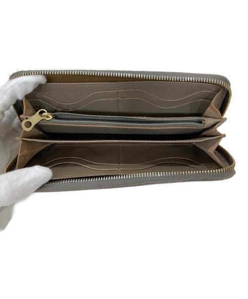 IL BISONTE（イル ビゾンテ）IL BISONTE (イル ビゾンテ) ZIP AROUND WALLET ベージュの古着・服飾アイテム