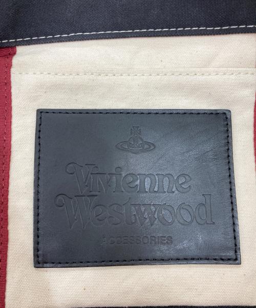 Vivienne Westwood（ヴィヴィアンウエストウッド）Vivienne Westwood (ヴィヴィアンウエストウッド) キャンバストートバッグ ブラック×アイボリーの古着・服飾アイテム