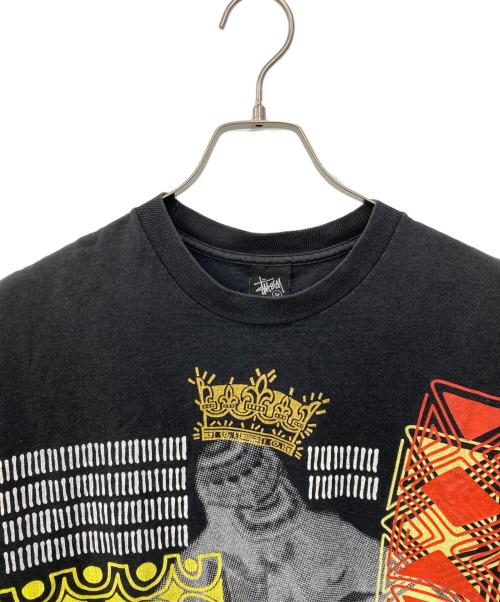 stussy（ステューシー）stussy (ステューシー) グラフィックプリントTシャツ ブラック サイズ:Ｍの古着・服飾アイテム