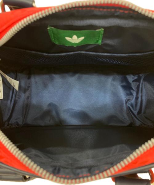 adidas（アディダス）adidas (アディダス) モノグラムラウンドバッグ レッドの古着・服飾アイテム
