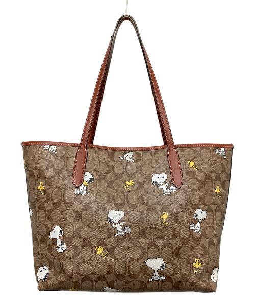 COACH（コーチ）COACH (コーチ) PEANUTS (ピーナッツ) シティー トート・シグネチャー スヌーピー ウッドストック ブラウンの古着・服飾アイテム