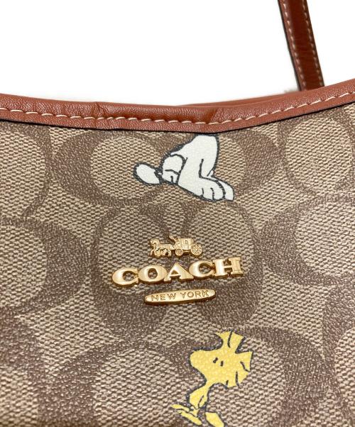 COACH（コーチ）COACH (コーチ) PEANUTS (ピーナッツ) シティー トート・シグネチャー スヌーピー ウッドストック ブラウンの古着・服飾アイテム