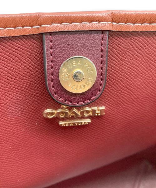 COACH（コーチ）COACH (コーチ) PEANUTS (ピーナッツ) シティー トート・シグネチャー スヌーピー ウッドストック ブラウンの古着・服飾アイテム