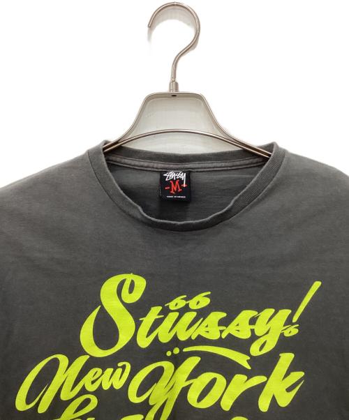 stussy（ステューシー）stussy (ステューシー) ワールドツアーtシャツ グレー サイズ:Mの古着・服飾アイテム
