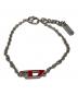 DIESEL（ディーゼル）の古着「ロゴブレスレット」｜レッド