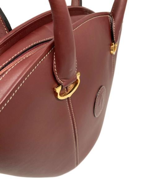 Cartier（カルティエ）Cartier (カルティエ) レザーハンドバッグ ボルドーの古着・服飾アイテム