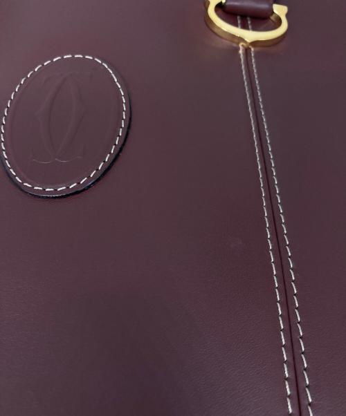 Cartier（カルティエ）Cartier (カルティエ) レザーハンドバッグ ボルドーの古着・服飾アイテム