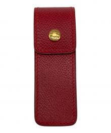 HERMES（エルメス）の古着「セリエボタン付きレザーケース」｜レッド