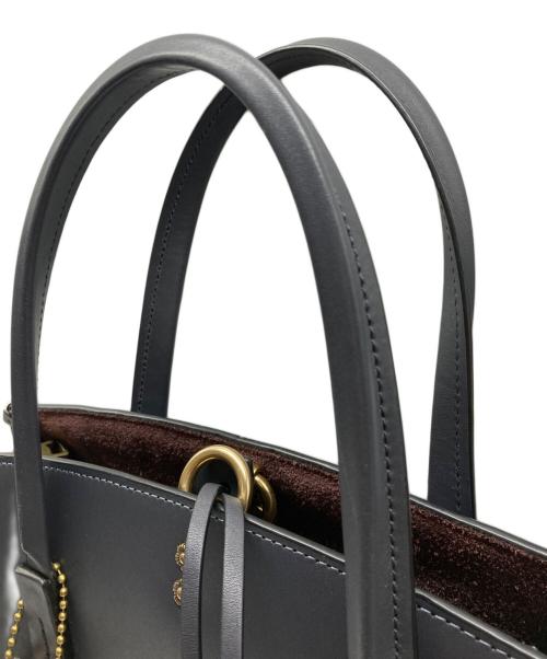 COACH（コーチ）COACH (コーチ) Cooper Carryall With Rivets ブラックの古着・服飾アイテム