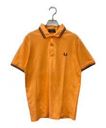 FRED PERRY（フレッドペリー）の古着「The Fred Perry Shirt」｜オレンジ