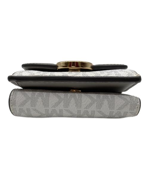 MICHAEL KORS（マイケルコース）MICHAEL KORS (マイケルコース) コンパクトウォレット グレーの古着・服飾アイテム