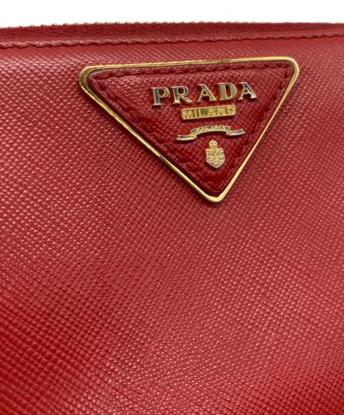 PRADA（プラダ）PRADA (プラダ) サフィアーノラウンドファスナーウォレット レッドの古着・服飾アイテム