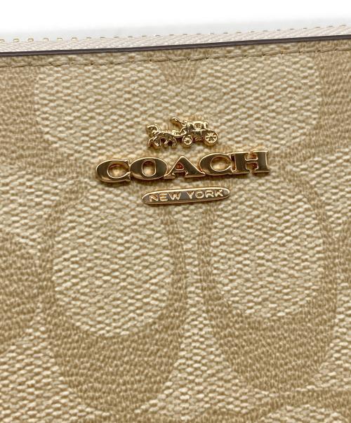 COACH（コーチ）COACH (コーチ) ロングジップアラウンドウォレットシグネチャーキャンバス ベージュの古着・服飾アイテム
