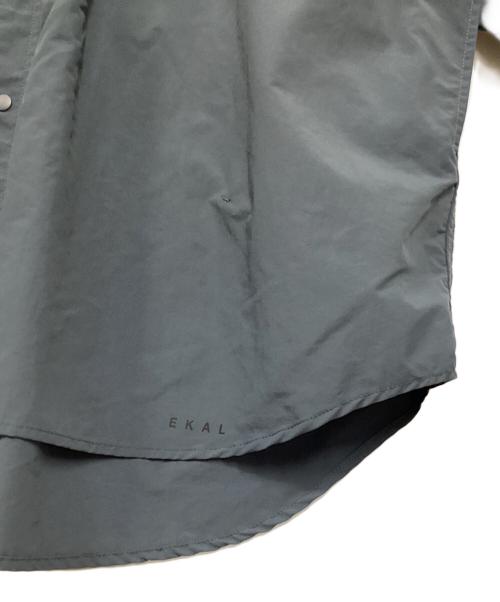 EKAL（エカル）EKAL (エカル) BURLAP OUTFITTER (バーラップアウトフィッター) ナイロンシャツ ブルー サイズ:LARGEの古着・服飾アイテム