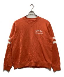 COACH（コーチ）の古着「ヴァーシティクルーネック」｜オレンジ