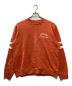 COACH（コーチ）の古着「ヴァーシティクルーネック」｜オレンジ