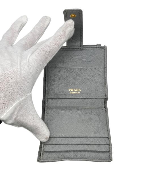 PRADA（プラダ）PRADA (プラダ) 2つ折り財布 スカイブルーの古着・服飾アイテム