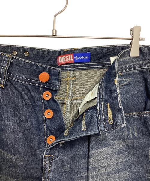 DIESEL（ディーゼル）DIESEL (ディーゼル) adidas (アディダス) コラボダメージ加工デニムパンツ インディゴ サイズ:33の古着・服飾アイテム