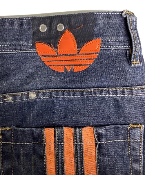 DIESEL（ディーゼル）DIESEL (ディーゼル) adidas (アディダス) コラボダメージ加工デニムパンツ インディゴ サイズ:33の古着・服飾アイテム