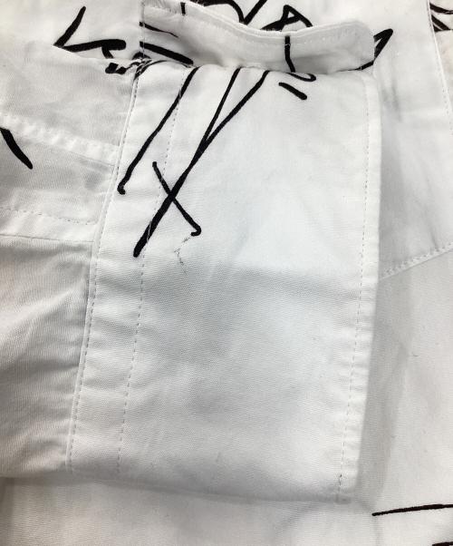 COMME des GARCONS HOMME PLUS（コムデギャルソンオムプリュス）COMME des GARCONS HOMME PLUS (コムデギャルソンオムプリュス) メッセージフリルシャツ ホワイト×ブラック サイズ:Sの古着・服飾アイテム